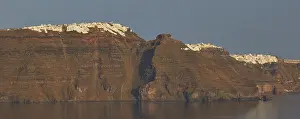 Cyclades Greece Tourism Drucke: View from Oia over the caldera to the cliffs