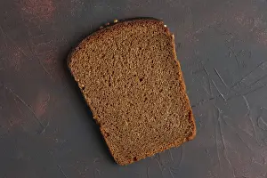 Bakery Products Image Drucke: Top view of piece of broun bread