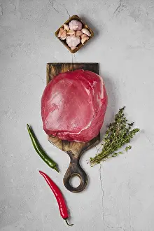 Top Down View Of Steak Drucke: Top view of raw beef top round meat