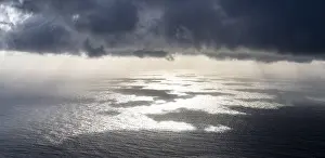 Cloudy Skies Over The Sea Drucke: View over the sea with clouds, Pacific