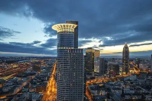 German Cityscape At Night Drucke: View of the skyline from a tower block in the evening