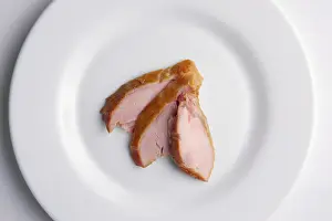 Fresh Ham Slices Drucke: Top view of slices of ham on a plate