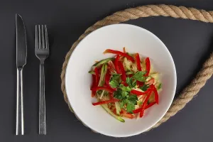 Vegetarian Meal Preparation Drucke: Top view of spring salad with paprika