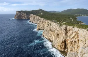 Steep Cliffs By The Sea Drucke: View of steep cliffs by the sea