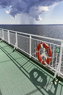 Stormy Baltic Sea Drucke: View of storm clouds from the sun deck of a ferry