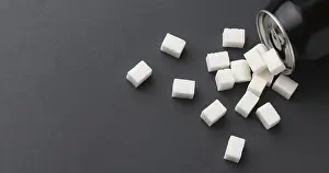 High Quality Photo Drucke: Top view can with sugar cubes copy space