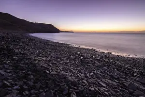 Morning Light On Rocks Drucke: View of the sunrise over the Atlantic