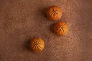 Balanced Diet Grocery Drucke: Top view of tangerines on orange background