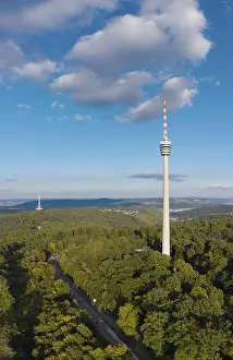 European Telecommunications Tower Drucke: View of a television tower above a dense forest