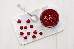 Homemade Preserves Recipe Drucke: Top view of transparent pot with raspberry jam