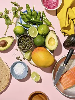 Vibrant Food Photography Drucke: Top view of a vibrant array of taco ingredients spread on a pink backdrop
