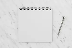 Time Management Tools Drucke: Top view white notebook marble desk