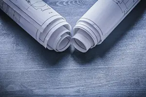 Blueprint Rolls Drucke: View on two white rolls of blueprints