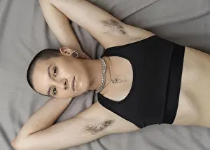 Woman In Swimsuit Drucke: Top view woman with body hair