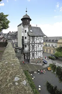 Half Timbered Construction In Germany Drucke: Villa with corner tower and wall