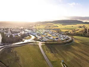 Uninhabited Village Scene Drucke: A village surrounded by fields