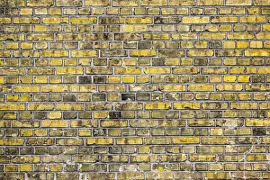 Vintage Brick Wall Background Drucke: Vintage yellow brick wall pattern background