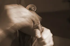 Handicraft Woodwork Drucke: Violin maker is working at the scroll of a violin