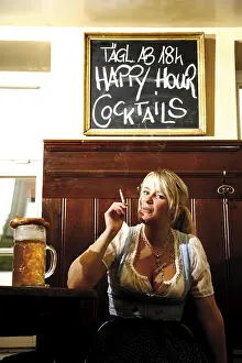 Traditional Bavarian Costume Drucke: Waitress smoking a cigarette