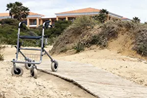 Physical Disability Support Drucke: Walking frame left on the beach