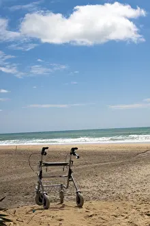 Disabled Person Support Drucke: Walking frame left on the beach