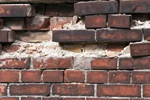 Deserted Brick Wall Drucke: Wall made of brick stones