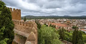 Deserted Fortress Spain Drucke: Wall of the old castle with tower