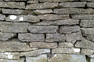 Uninhabited Stone Walls Drucke: Wall made of stacked stone slabs
