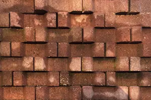 Southern Europe Background Image Drucke: Wall structure of red concrete blocks