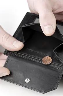 Foreign Currency Exchange Drucke: Wallet opened to show last cent