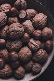 Autumnal Still Life Drucke: Walnut and hazelnut, close-up, top view