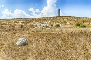 Rocky Beach Landscape Drucke: The watch tower of the serpent