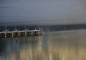Upper Austria Landscapes Drucke: Water reflection with bathing jetty and deckchairs
