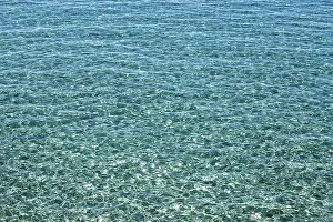 Turquoise Blue Waters Drucke: Water surface with small waves and clear water