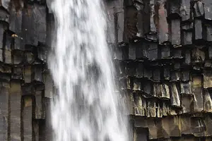 Igneous Rock Formations Drucke: Waterfall, basalt columns, winter