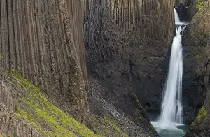 Volcanic Rock Formations Europe Drucke: Waterfall Litlanesfoss between columnar basalt