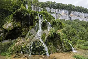 Waterfall In Europe Drucke: Waterfall and moss-covered rocks