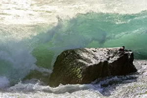 Stormy Weather Photography Drucke: Waves breaking on the stone during sunset