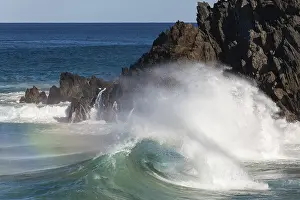 Colorful Rock Formations Drucke: Waves crash against rocks at the mainland's easternmost point