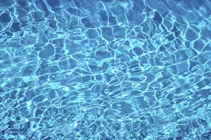 Deserted Swimming Pool Drucke: Wavy blue water surface with reflections