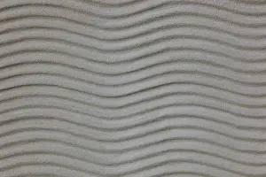 Empty Building Site Photo Drucke: Wavy plaster structure on a building