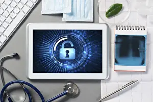 Healthcare System Symbolic Drucke: Web security and technology concept with tablet pc on table