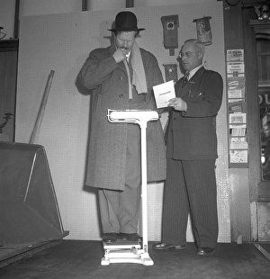 Black And White Food Photography Drucke: On the weighing scale in the 1940s