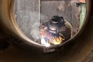 Deserted Factory Plant Drucke: Welder at work