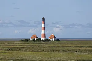 Westerhever Lighthouse Drucke: Westerhever Lighthouse with cloud sky