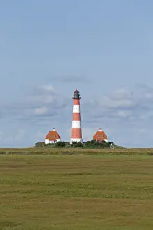 Westerhever Lighthouse Drucke: Westerhever Lighthouse with cloud sky