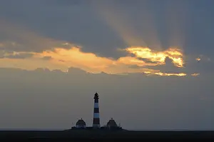 Westerhever Lighthouse Drucke: Westerhever lighthouse at sunset