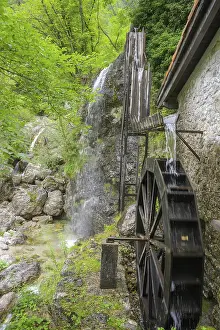 Deserted Waterfall Europe Drucke: Mill wheel and waterfall at the old mill