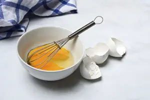 Kitchen Food Photography Drucke: Whipped egg in shell with whisk, egg shells