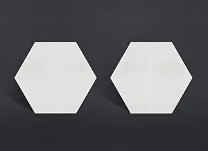 Blank Business Card Template Drucke: Two white hexagonal papers displayed on a dark background